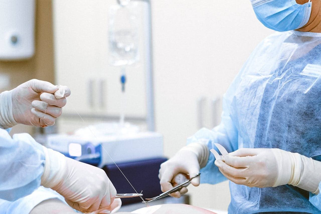 Endocrinologist examining thyroid cancer patient at Vietnamese medical center